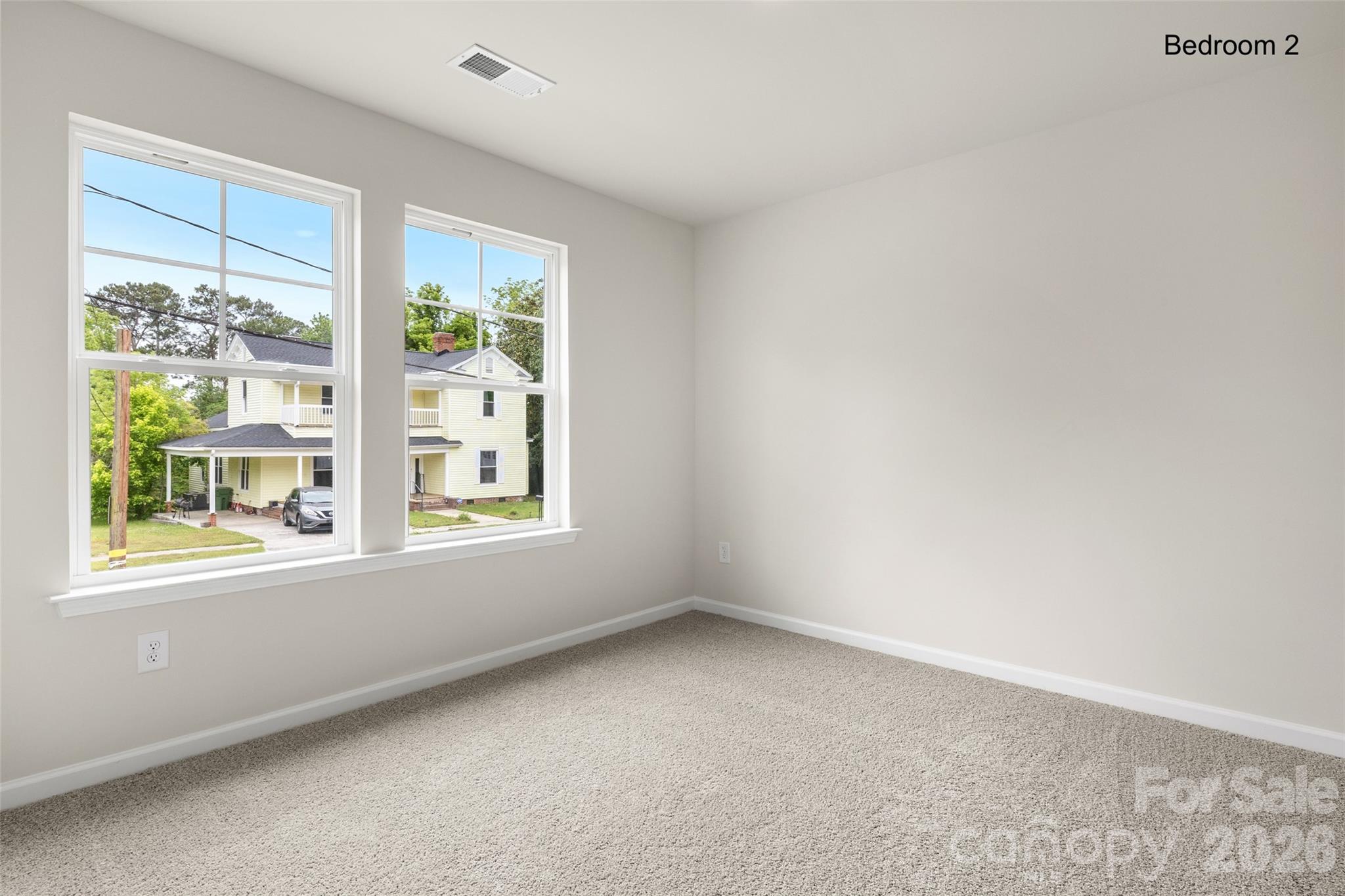 302 Elm Street Lancaster, SC 29720 - Photo 20 of 25 an empty room with a window