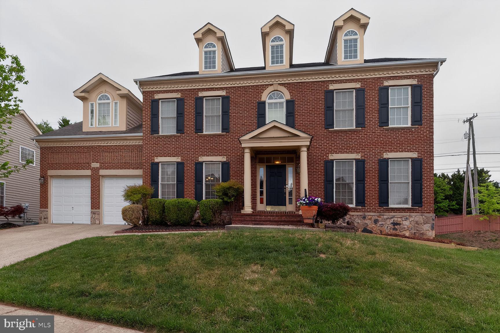 Classic brick home with charming details.