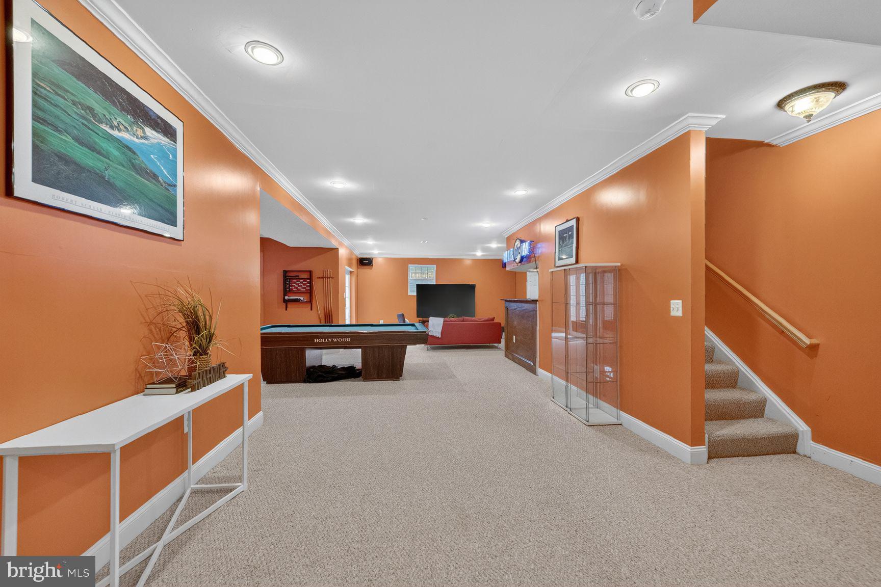3607 Ox Ridge Court Fairfax, VA 22033 - Photo 16 of 19 Inviting basement retreat with vibrant hues.