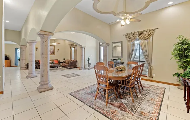 a view of a dining room with furniture