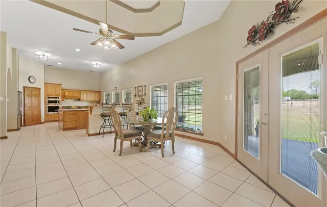 a view of a dining room kitchen and a window