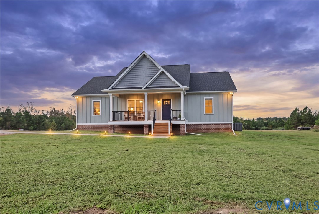 115 Jenkins Church Road Cumberland, VA 23040 - Photo 1 of 28 Ranch-style residence featuring light blue siding,