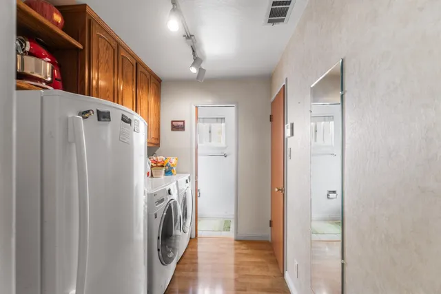 a view of a wooden door and a yard