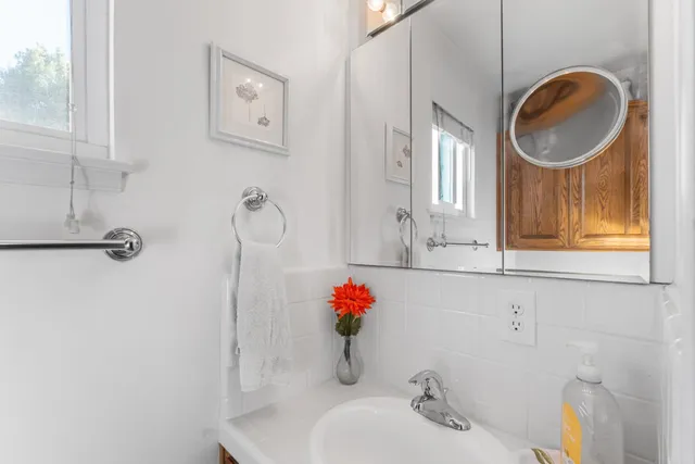 a view of backyard with seating and green space