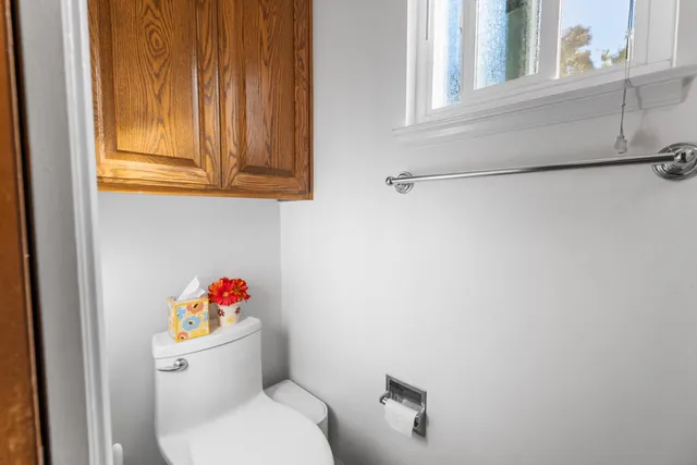 an aerial view of a house with yard swimming pool and outdoor seating