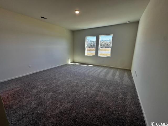 147 Linares Street Loris, SC 29569 - Photo 11 of 17 Unfurnished room featuring dark carpet