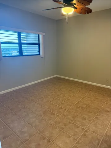 en empty room with a window