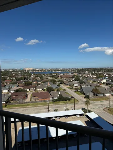 a view of a backyard with furniture and a table