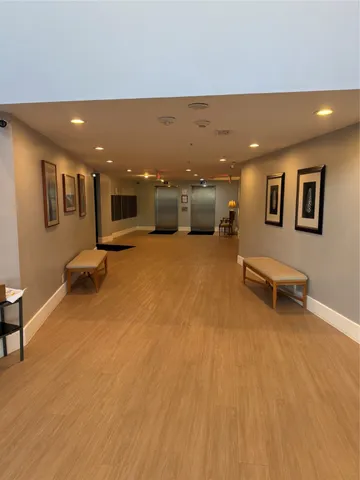 a view of a living room a room with pool table and a couch