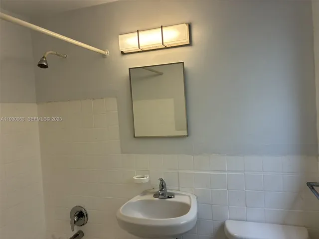 a bathroom with a sink and a bathtub