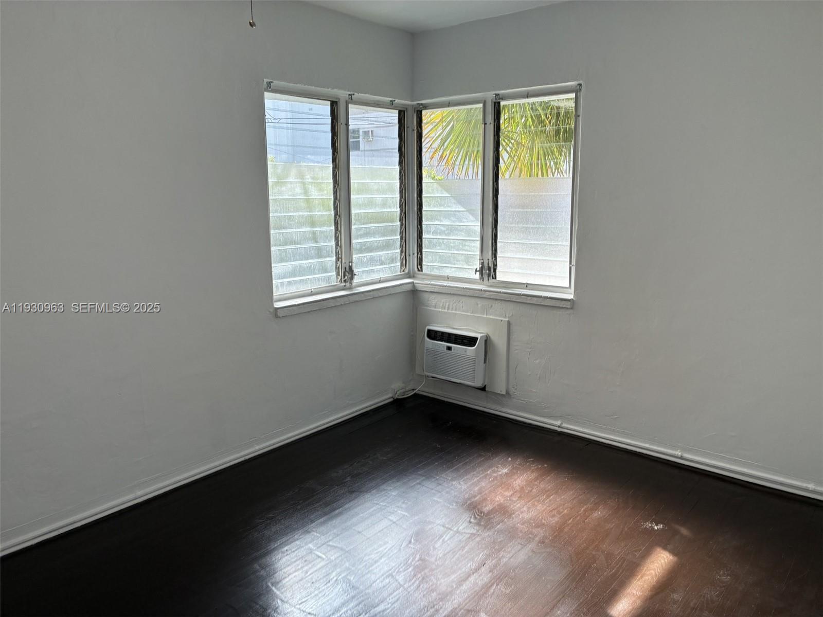 2469 Flamingo Place, Unit 2 Miami Beach, FL 33140 - Photo 18 of 22 an empty room with a window