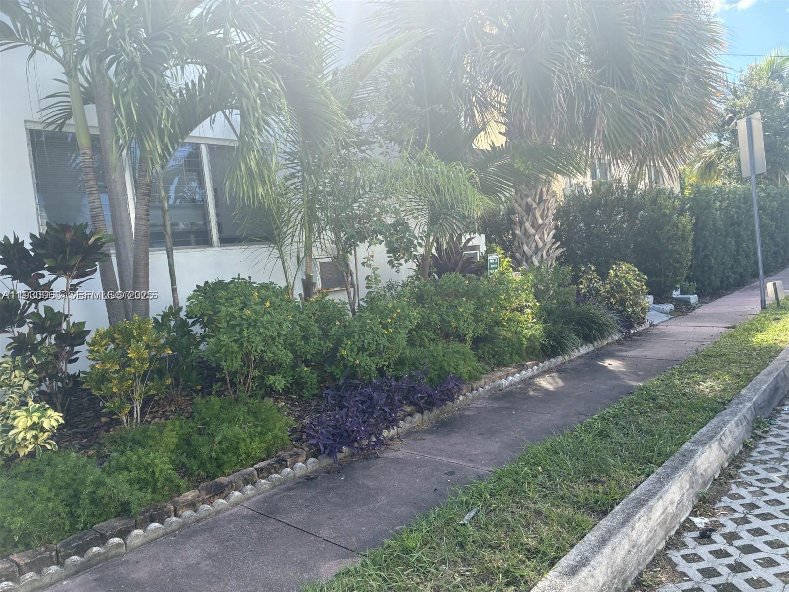 2469 Flamingo Place, Unit 2 Miami Beach, FL 33140 - Photo 21 of 22 a view of a pathway both side of yard