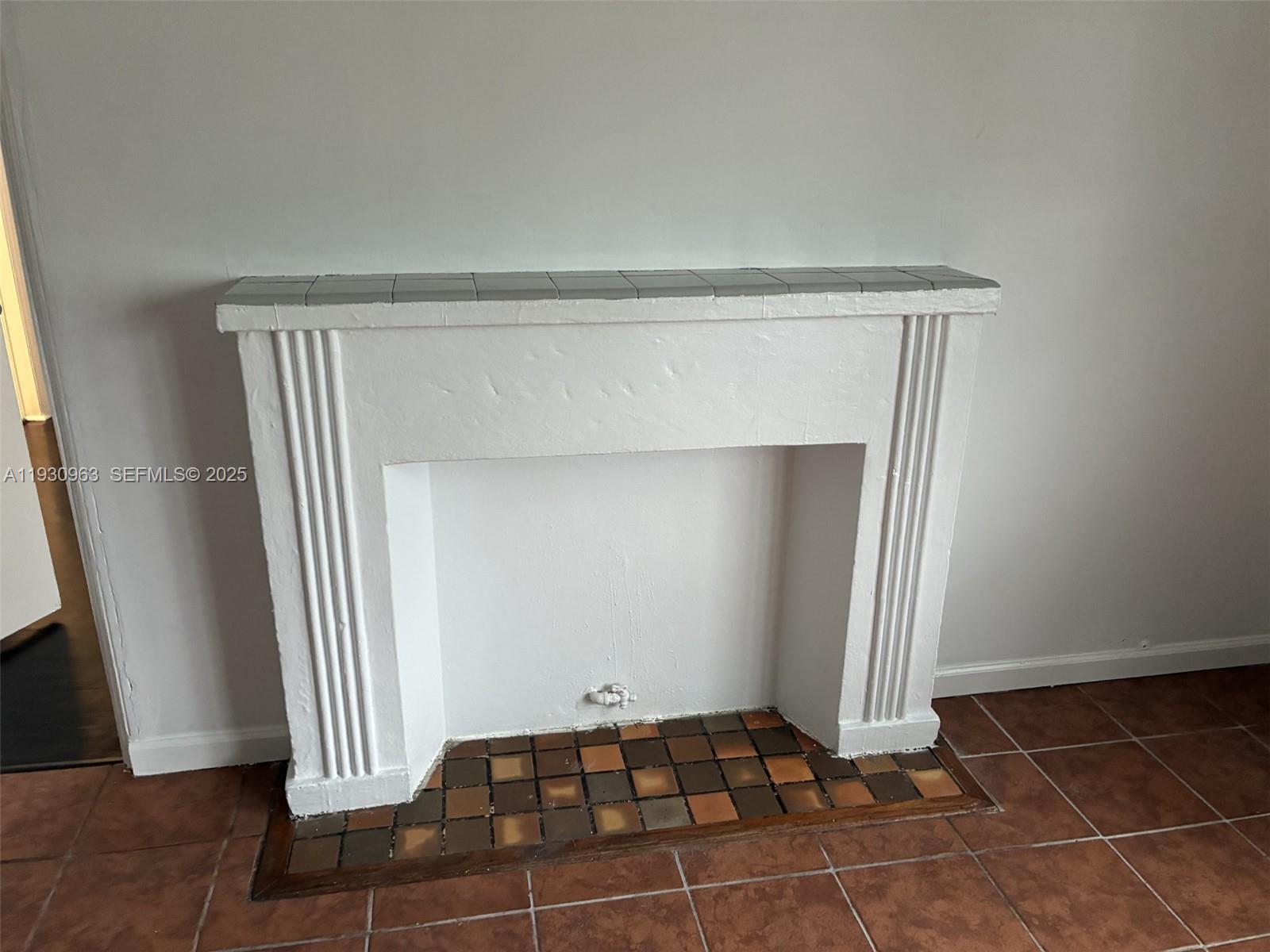 2469 Flamingo Place, Unit 2 Miami Beach, FL 33140 - Photo 6 of 22 a view of a room with wooden floor and a cabinet