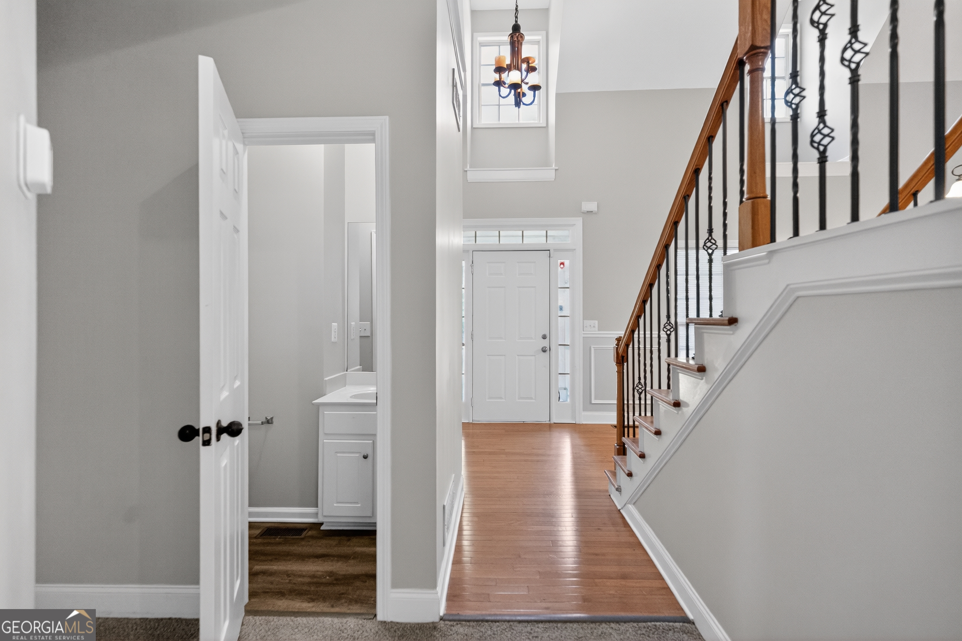 178 Rachel Boulevard Temple, GA 30179 - Photo 7 of 30 a view of a hallway with wooden floor and entryway