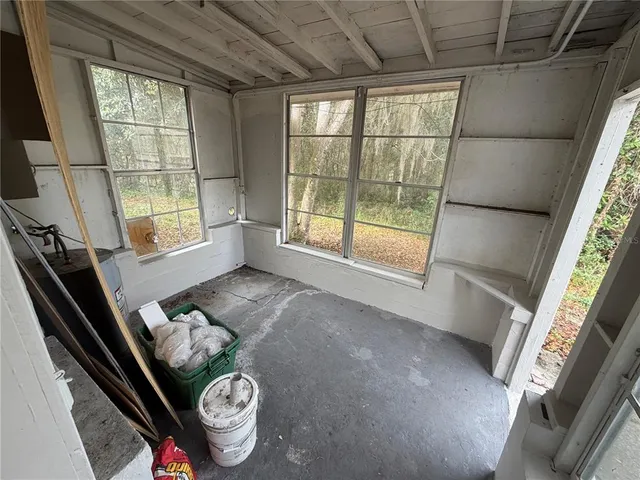 a room with furniture and window