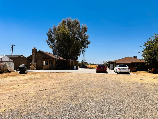 a view of a street with a building in the background