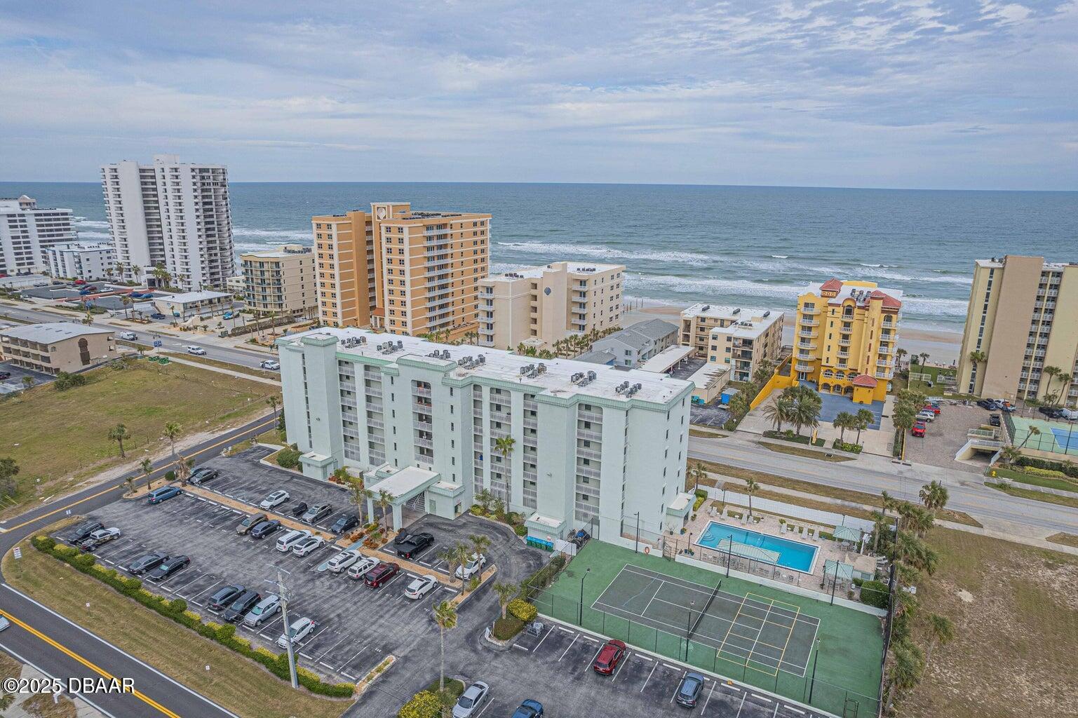 a view of a city with tall buildings