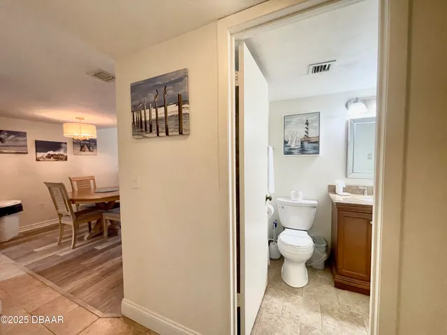 a bathroom with a toilet and a sink