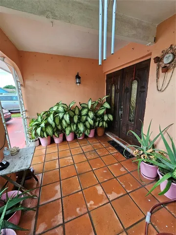 a vase of flowers sitting on a table