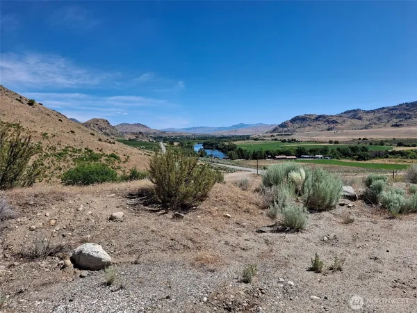 a view of a lake with mountains in the background