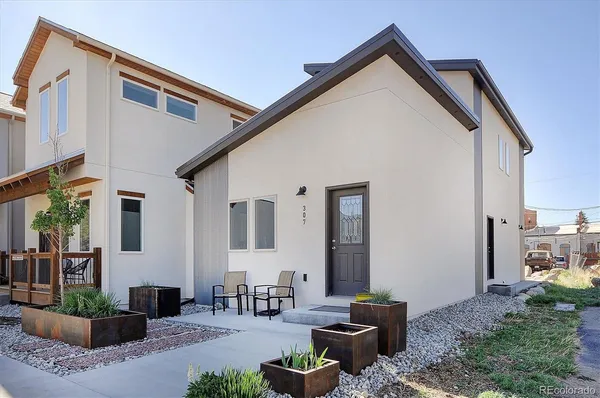 a front view of a house with patio