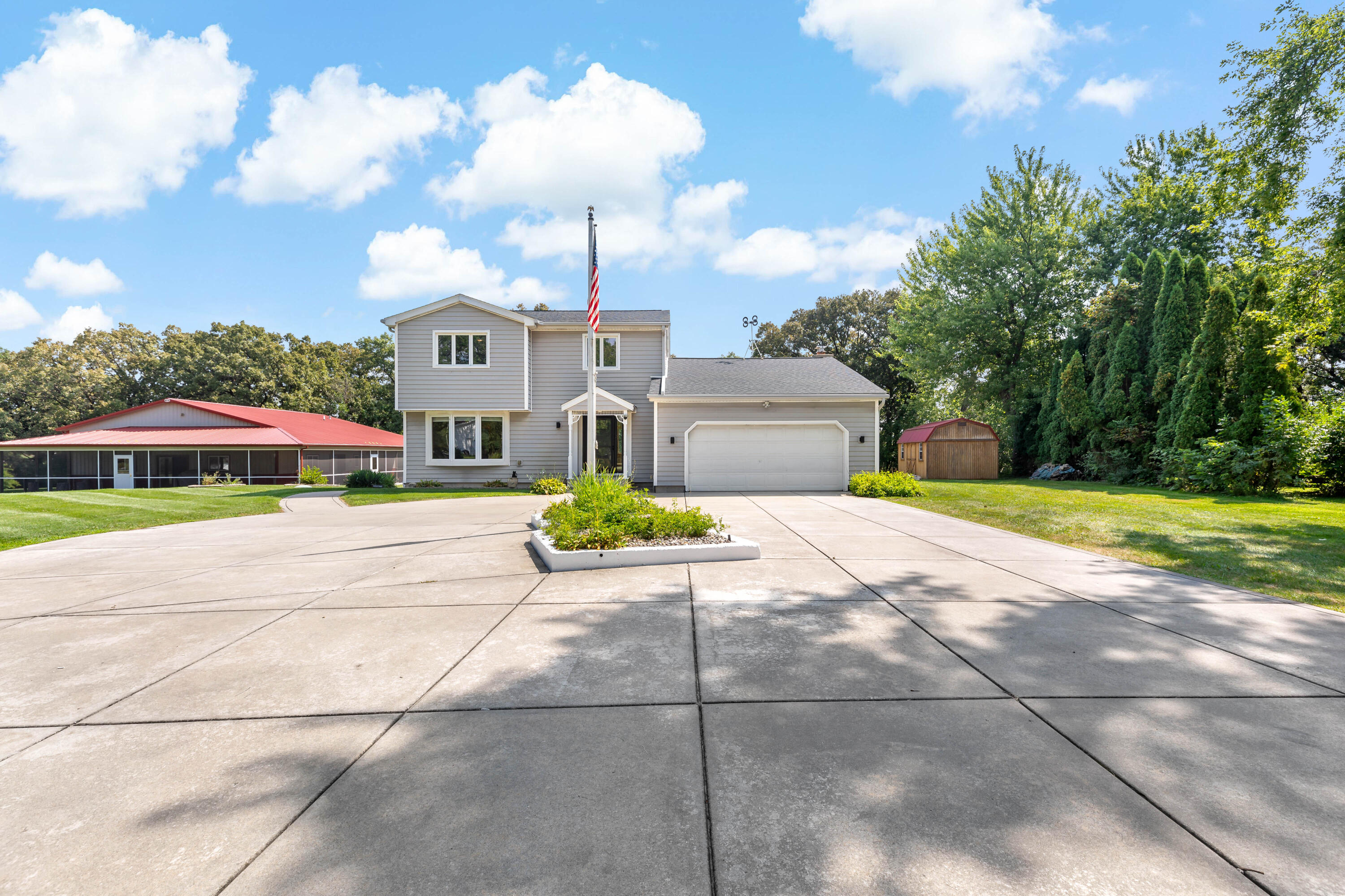 5496 West 107th Court Crown Point, IN 46307 - Photo 3 of 48 a front view of a house with a yard