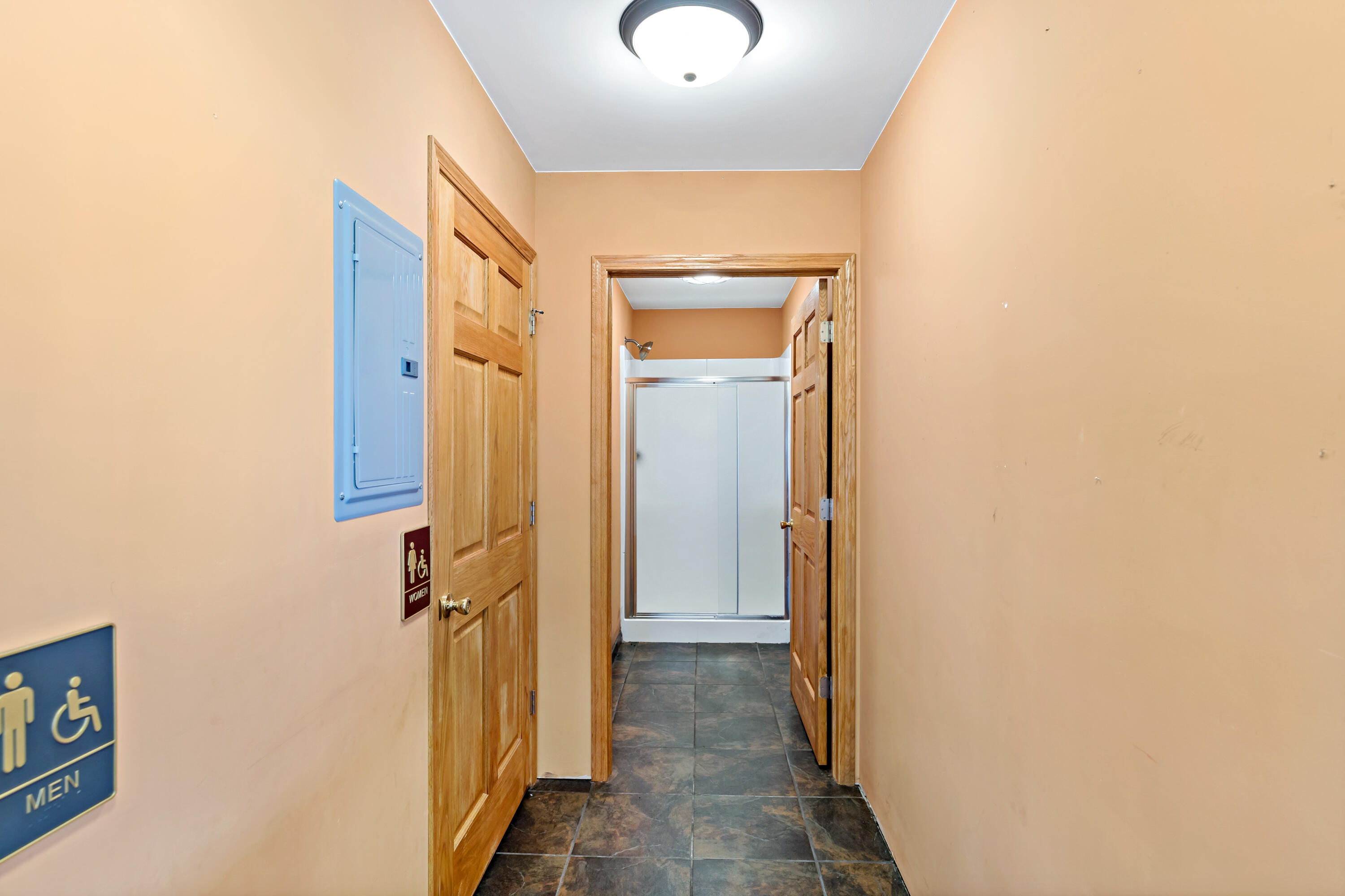 5496 West 107th Court Crown Point, IN 46307 - Photo 38 of 48 a view of a bathroom from a hallway