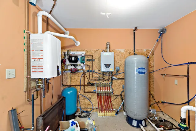 a house view with a sitting space and garden