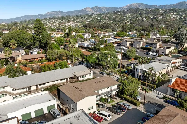 an aerial view of a city with lots of residential buildings