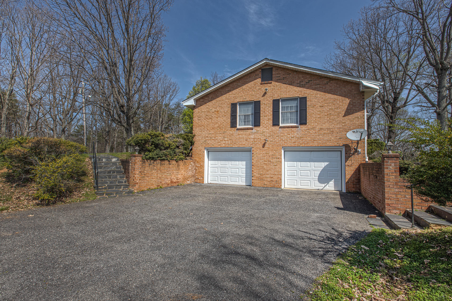 2080 Goodview Town Road, Unit 2082 Goodview, VA 24095 - Photo 38 of 96 a front view of a house with a yard and garage