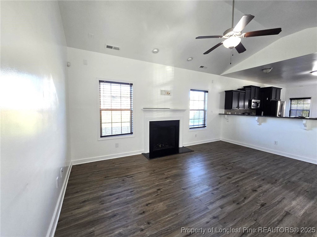 2816 Deepwater Court Fayetteville, NC 28306 - Photo 11 of 34 a view of empty room with wooden floor and fan