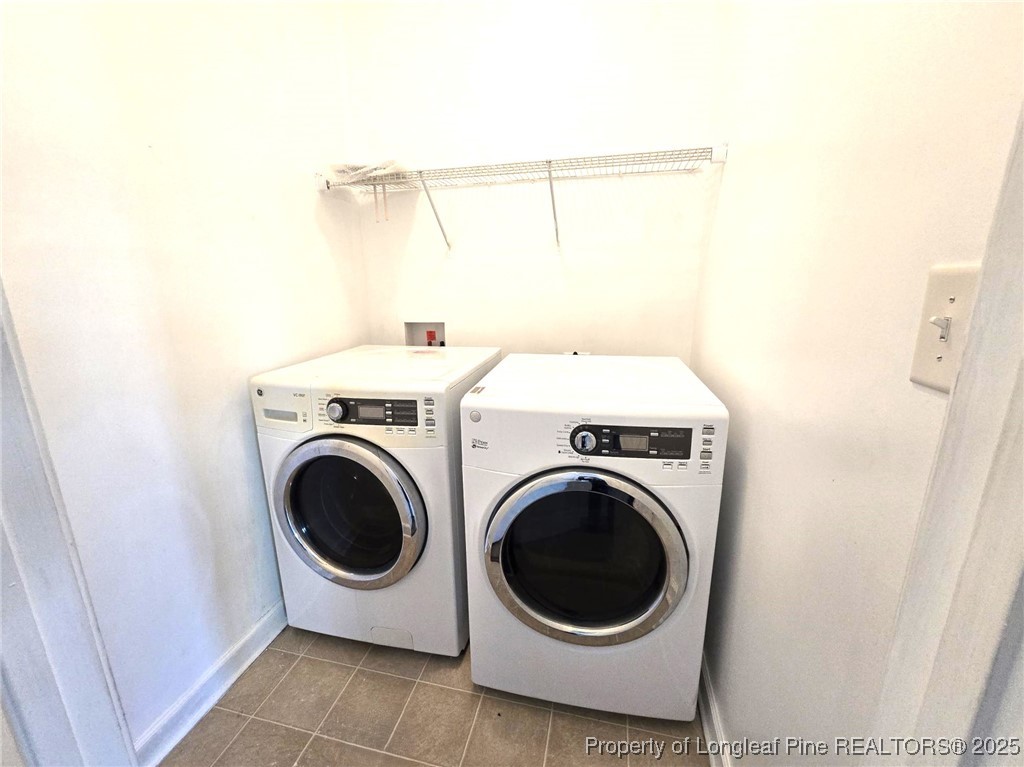 2816 Deepwater Court Fayetteville, NC 28306 - Photo 22 of 34 a utility room with dryer and washer