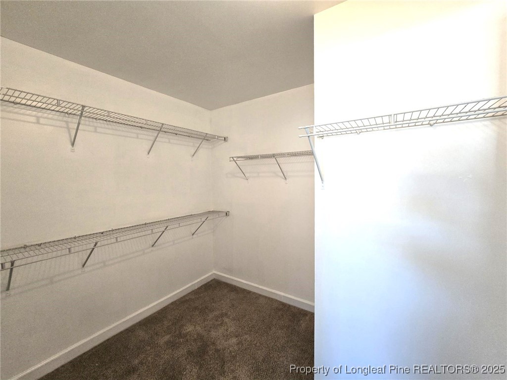 2816 Deepwater Court Fayetteville, NC 28306 - Photo 25 of 34 a view of a room with racks on the wall