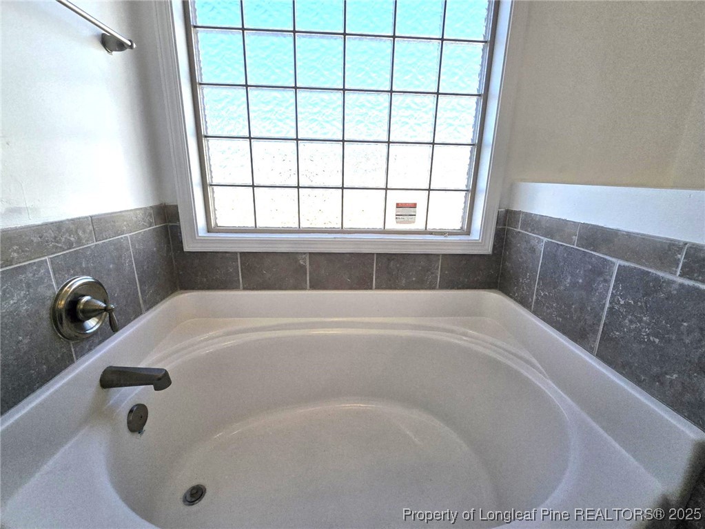 2816 Deepwater Court Fayetteville, NC 28306 - Photo 28 of 34 a bathroom with a tub