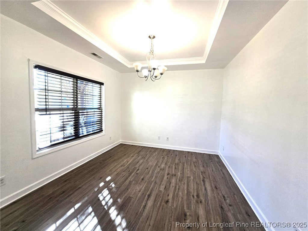 2816 Deepwater Court Fayetteville, NC 28306 - Photo 6 of 34 wooden floor in an empty room with a window