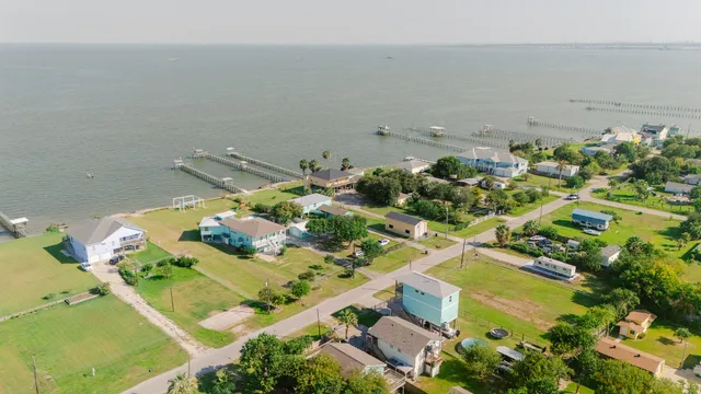 a view of a kitchen with a table and chairs