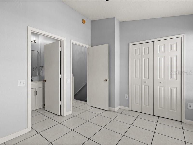 29924 Playa Del Rey Lane Wesley Chapel, FL 33543 - Photo 12 of 31 a view of an empty room with closet area
