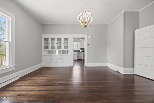 a view of dresser and window