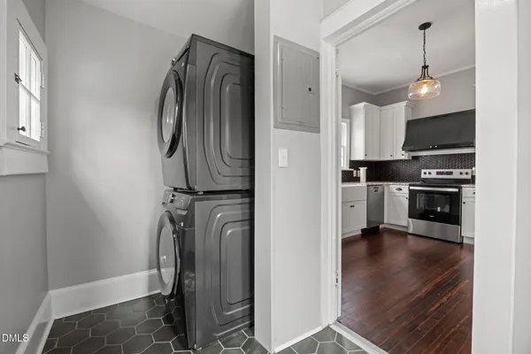 a kitchen with a stove and cabinets
