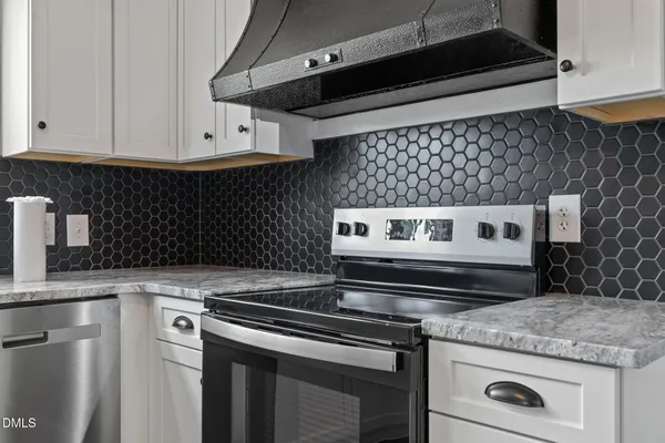 a view of backyard with a deck