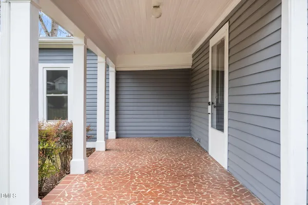 a view of a house with a roof deck