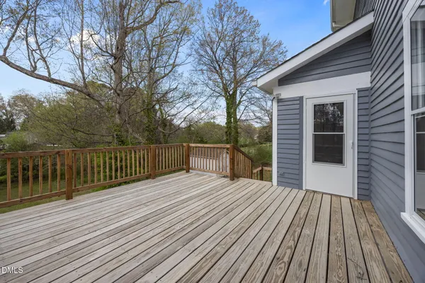 aerial view of a house with a yard