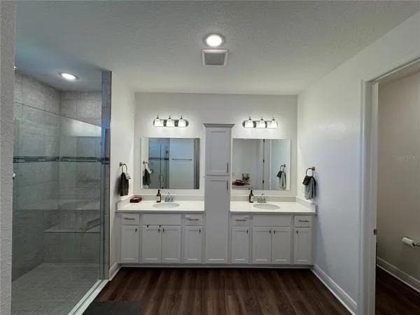 a bathroom with a toilet and a sink