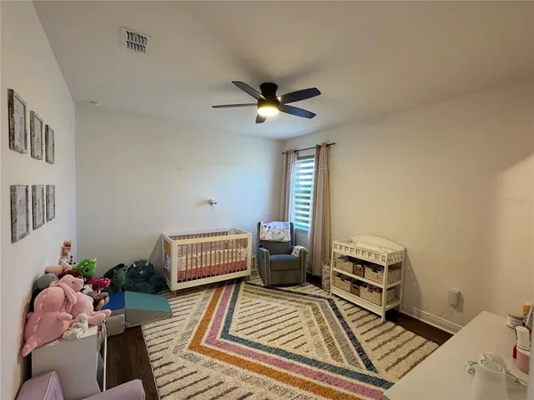 a bathroom with a double vanity sink a vanity and shower