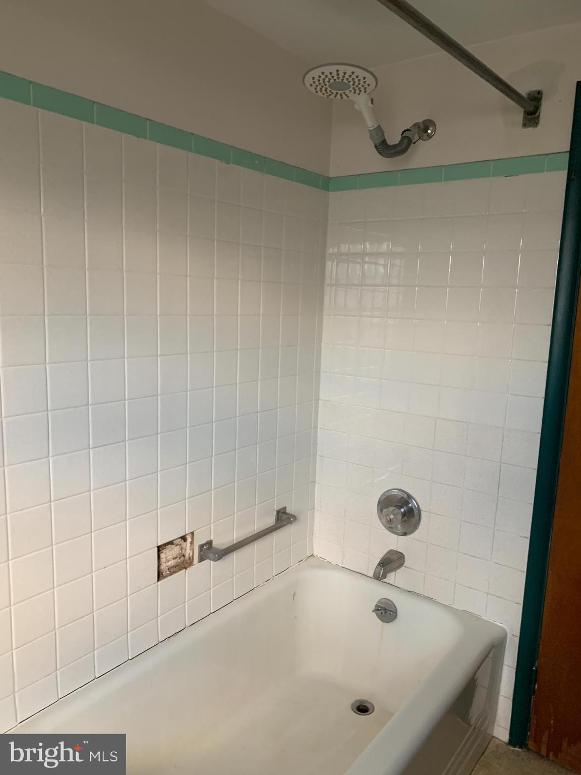 1231 High Street Lancaster, PA 17603 - Photo 15 of 16 a bathroom with a tub and shower