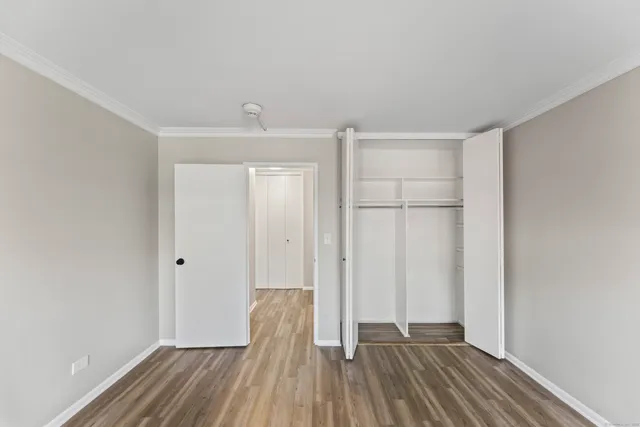 a view of wooden floor in an empty room