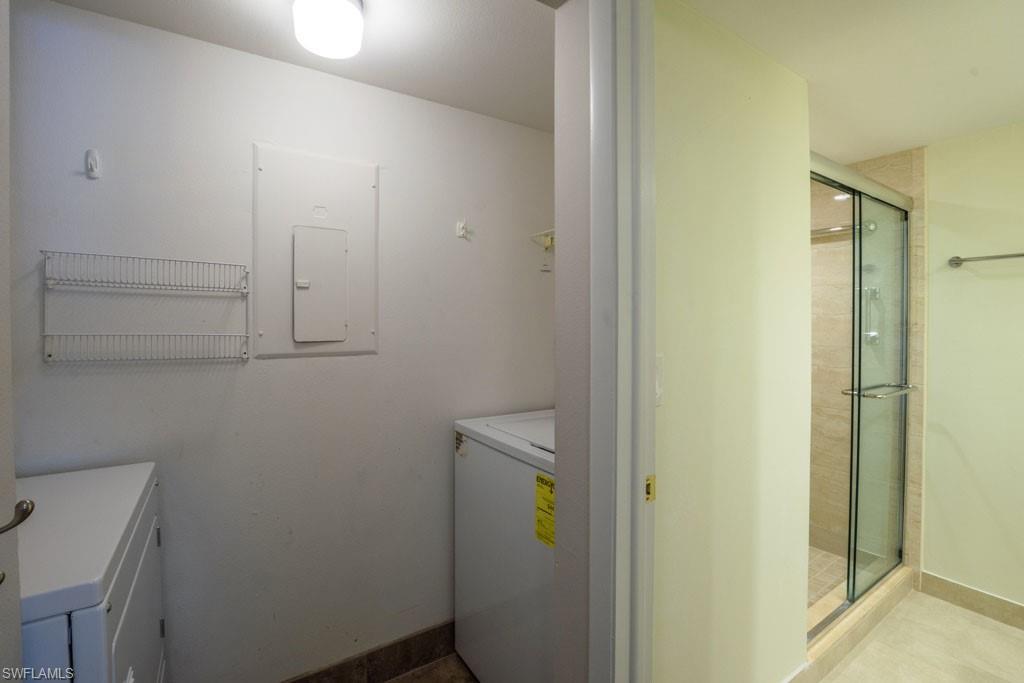 1 High Point Circle West, Unit 203 Naples, FL 34103 - Photo 14 of 31 a bathroom with a shower