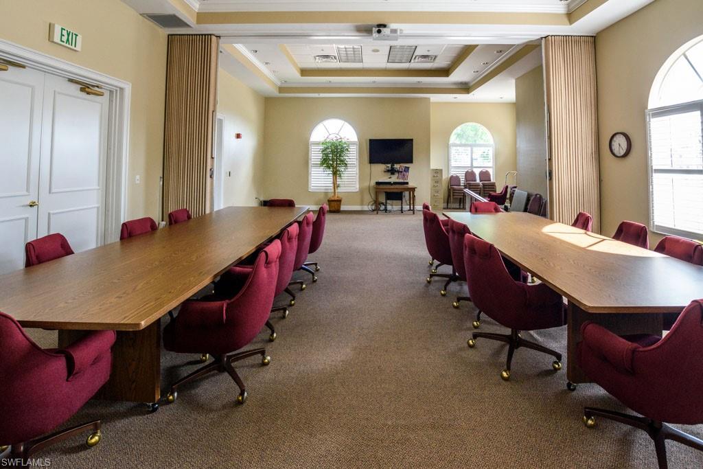 1 High Point Circle West, Unit 203 Naples, FL 34103 - Photo 31 of 31 a view of a dining room with furniture