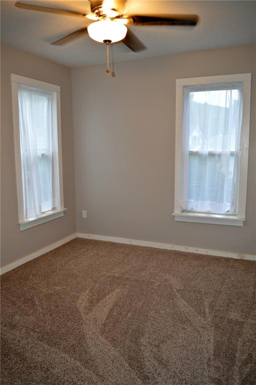 223 Mercer Street Butler, PA 16001 - Photo 11 of 21 2nd Floor bedroom with walk in closet. New Ceiling Fan.