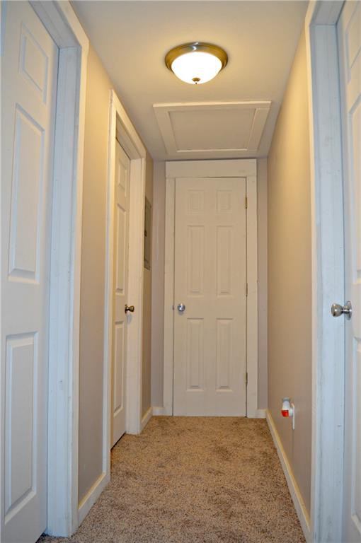 223 Mercer Street Butler, PA 16001 - Photo 17 of 21 3rd floor hallway, new carpet, doors, fixtures, and trim throughout. With hallway closet and sub box that handles all 3rd floor electric. Can turn off the third floor if and when not in use.